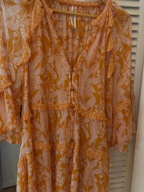 Anthropologie ruffle blouse, soft orange with White Print